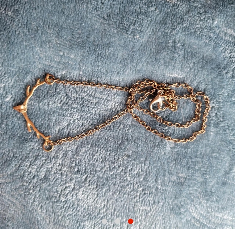 Deer head antler necklace